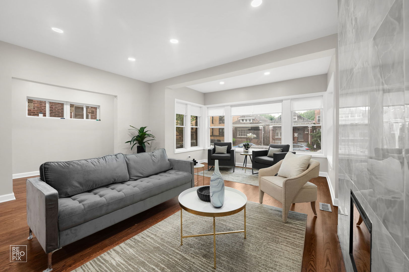 7425 South Vernon Avenue Chicago, IL 60619 - Photo 3 of 15 a living room with furniture and a table