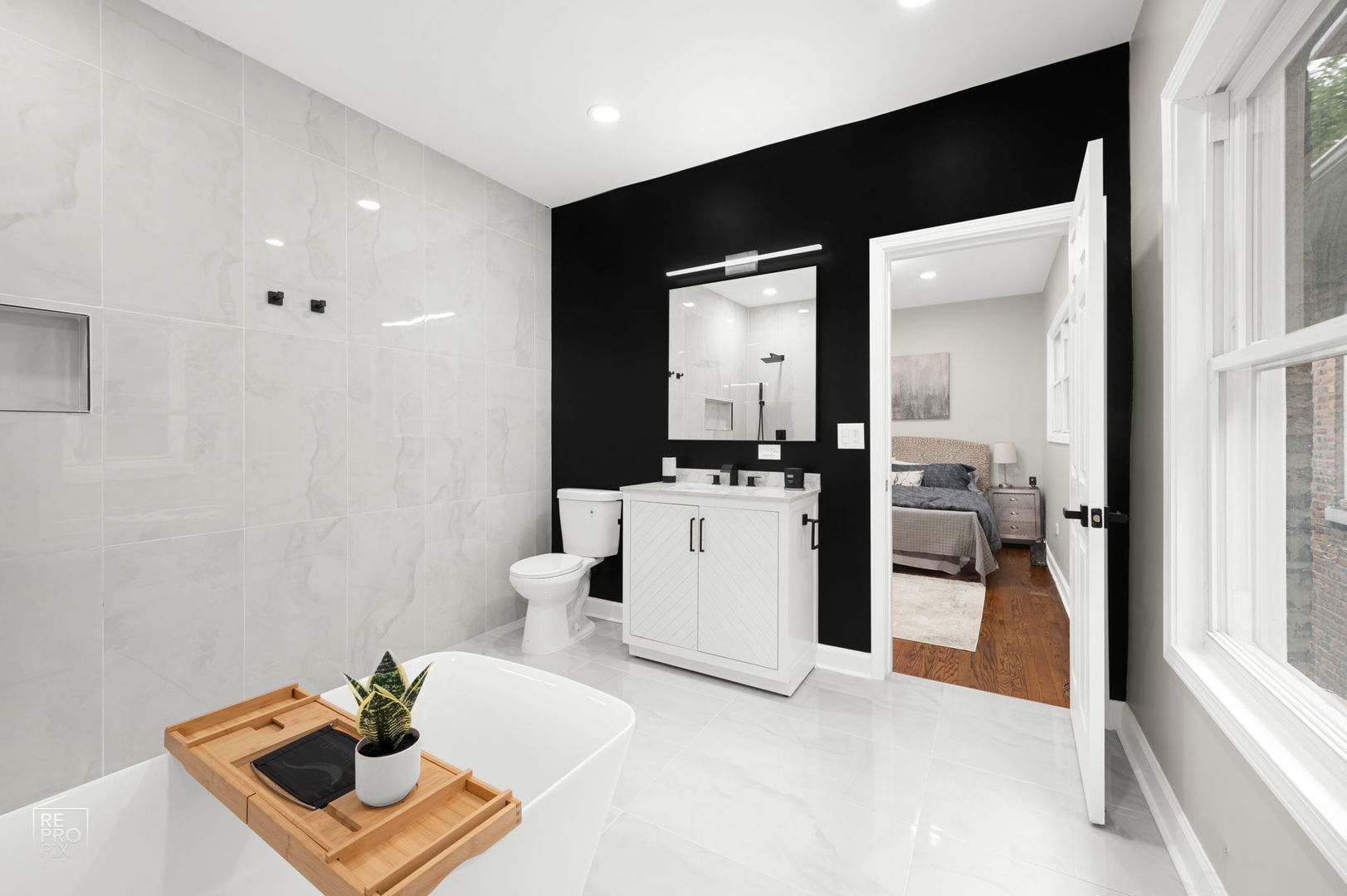 7425 South Vernon Avenue Chicago, IL 60619 - Photo 8 of 15 a living room with furniture and view of kitchen