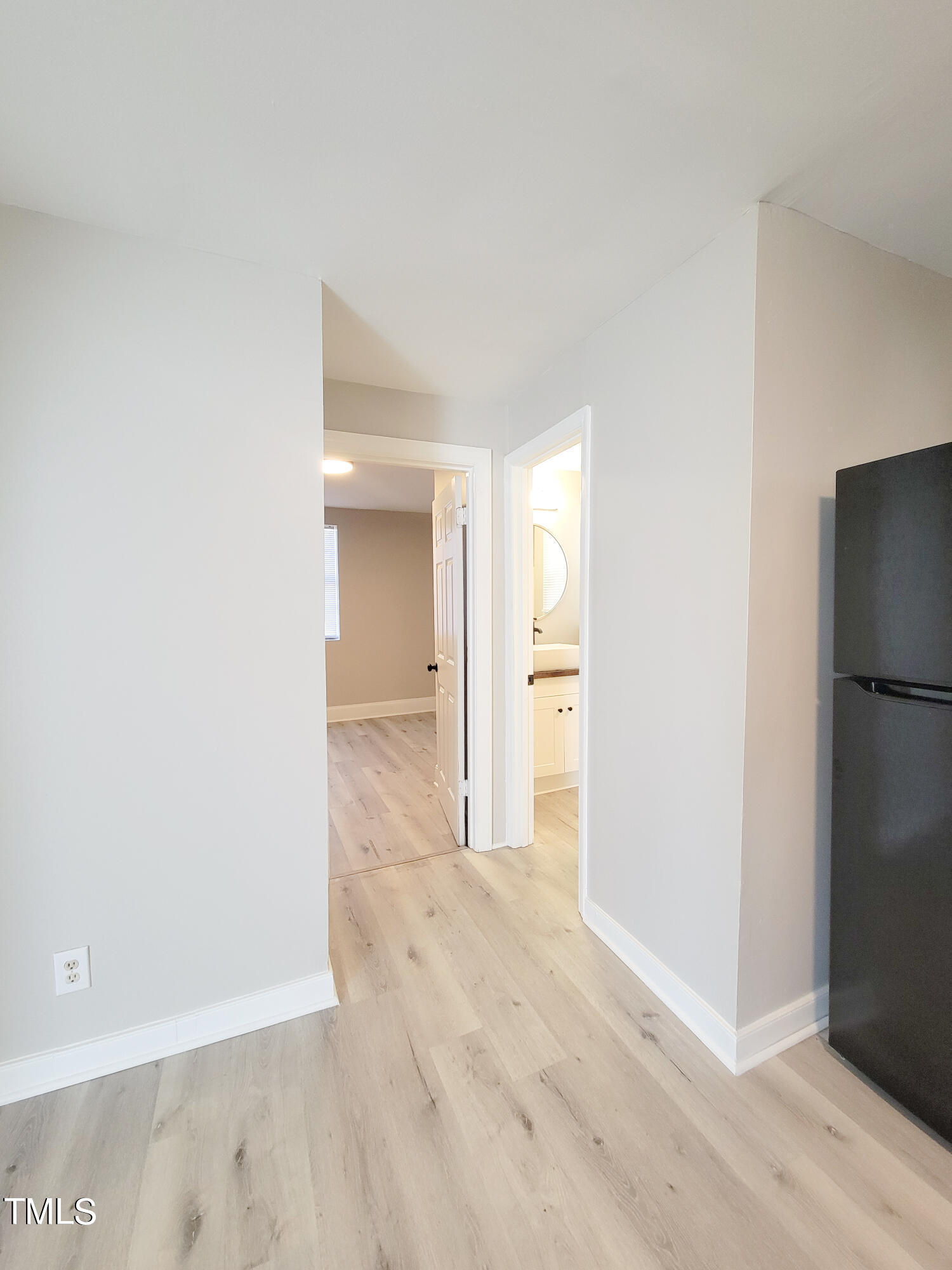 1611 Cross Street Raleigh, NC 27610 - Photo 14 of 22 a view of a room with a hallway