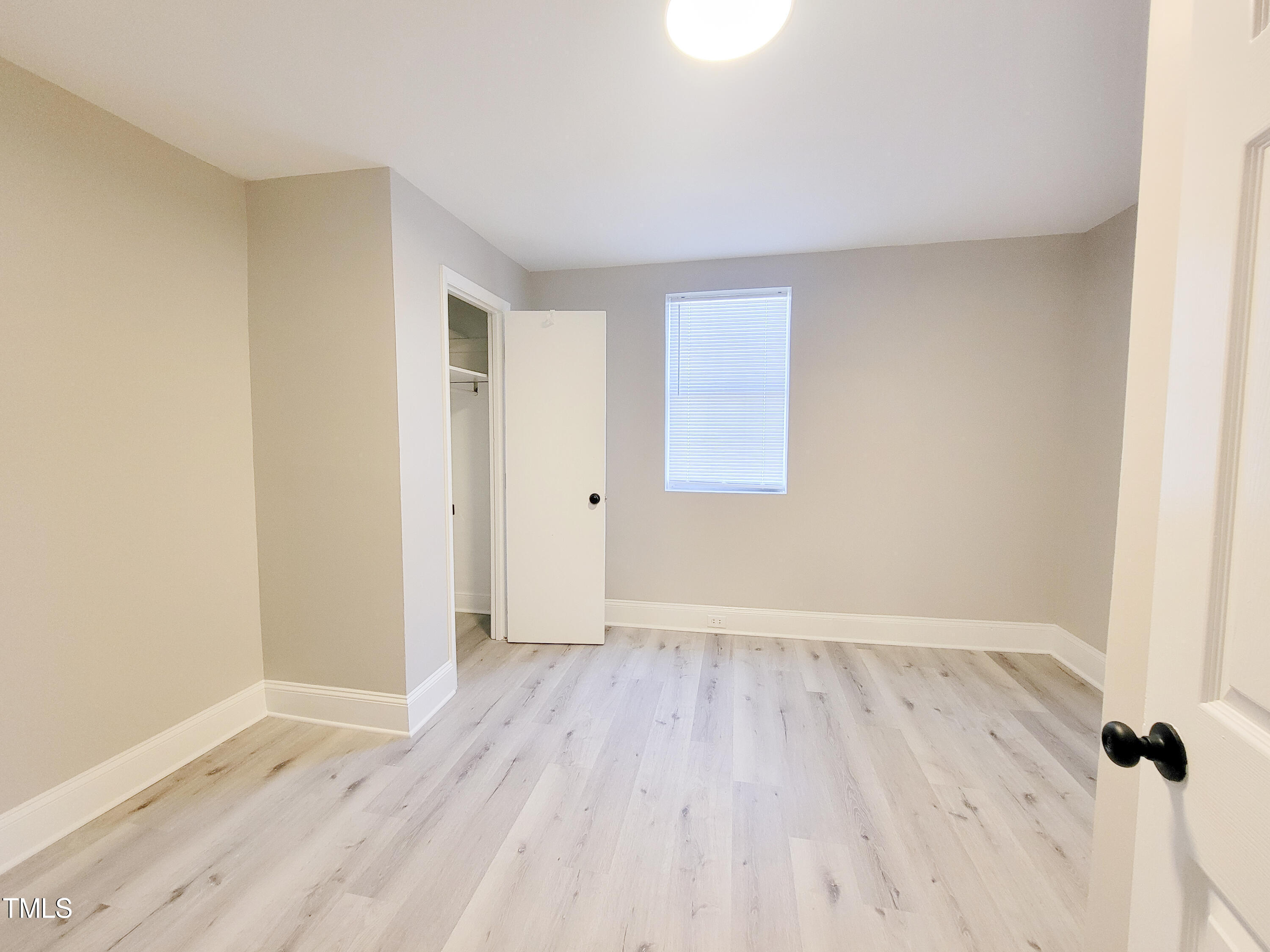 1611 Cross Street Raleigh, NC 27610 - Photo 15 of 22 an empty room with wooden floor