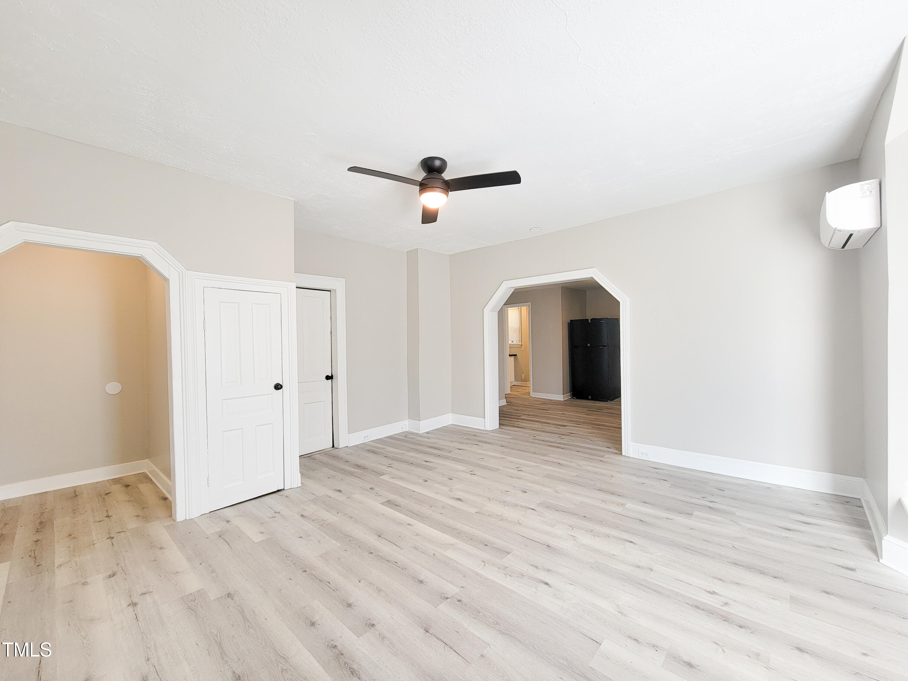 1611 Cross Street Raleigh, NC 27610 - Photo 7 of 22 a view of a livingroom with a ceiling fan