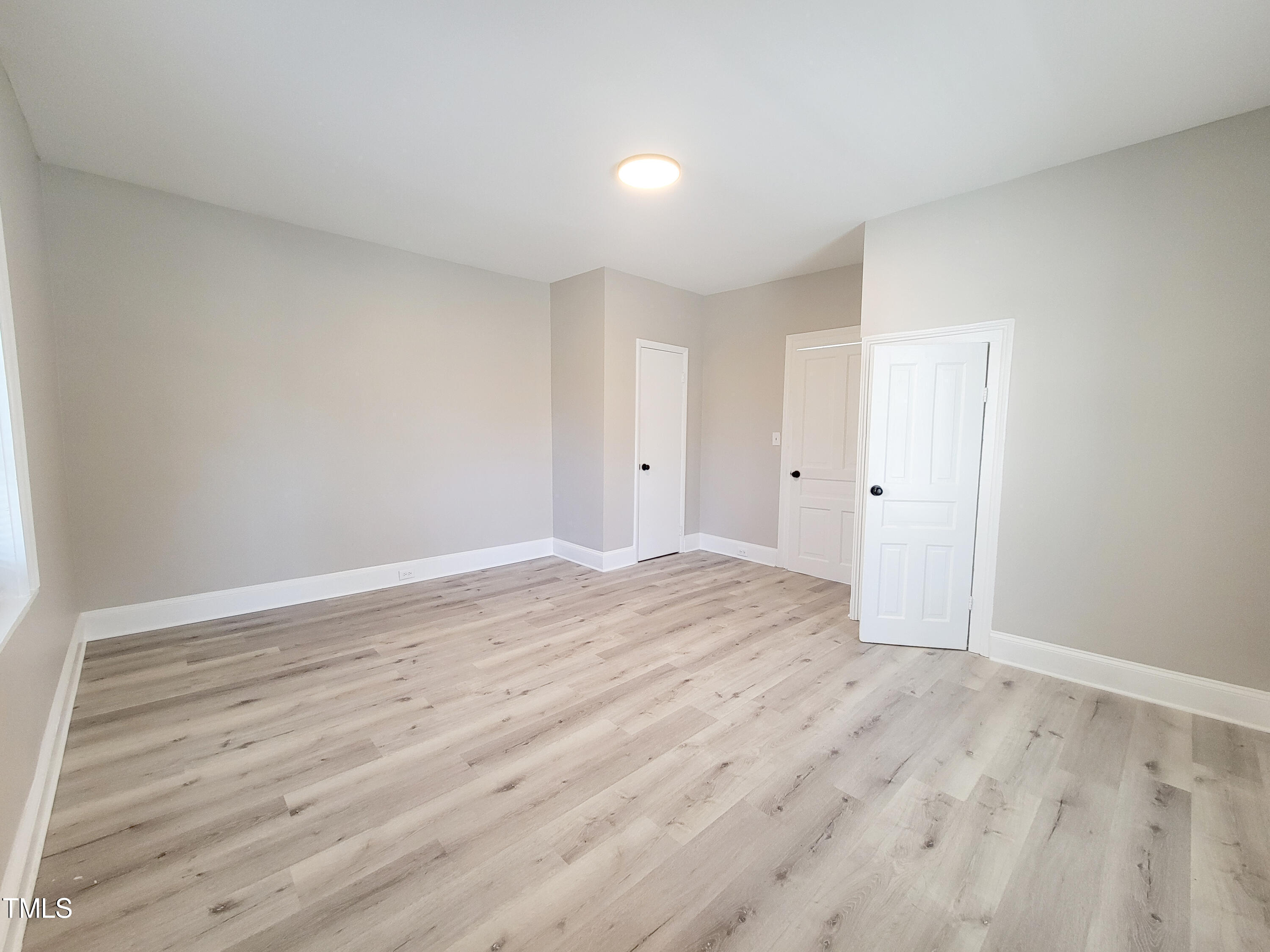1611 Cross Street Raleigh, NC 27610 - Photo 9 of 22 wooden floor in an empty room
