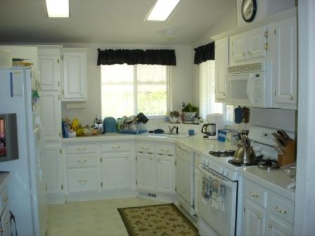 22155 Old Alturas Road Redding, CA 96003 - Photo 5 of 5 a kitchen with sink cabinets and window