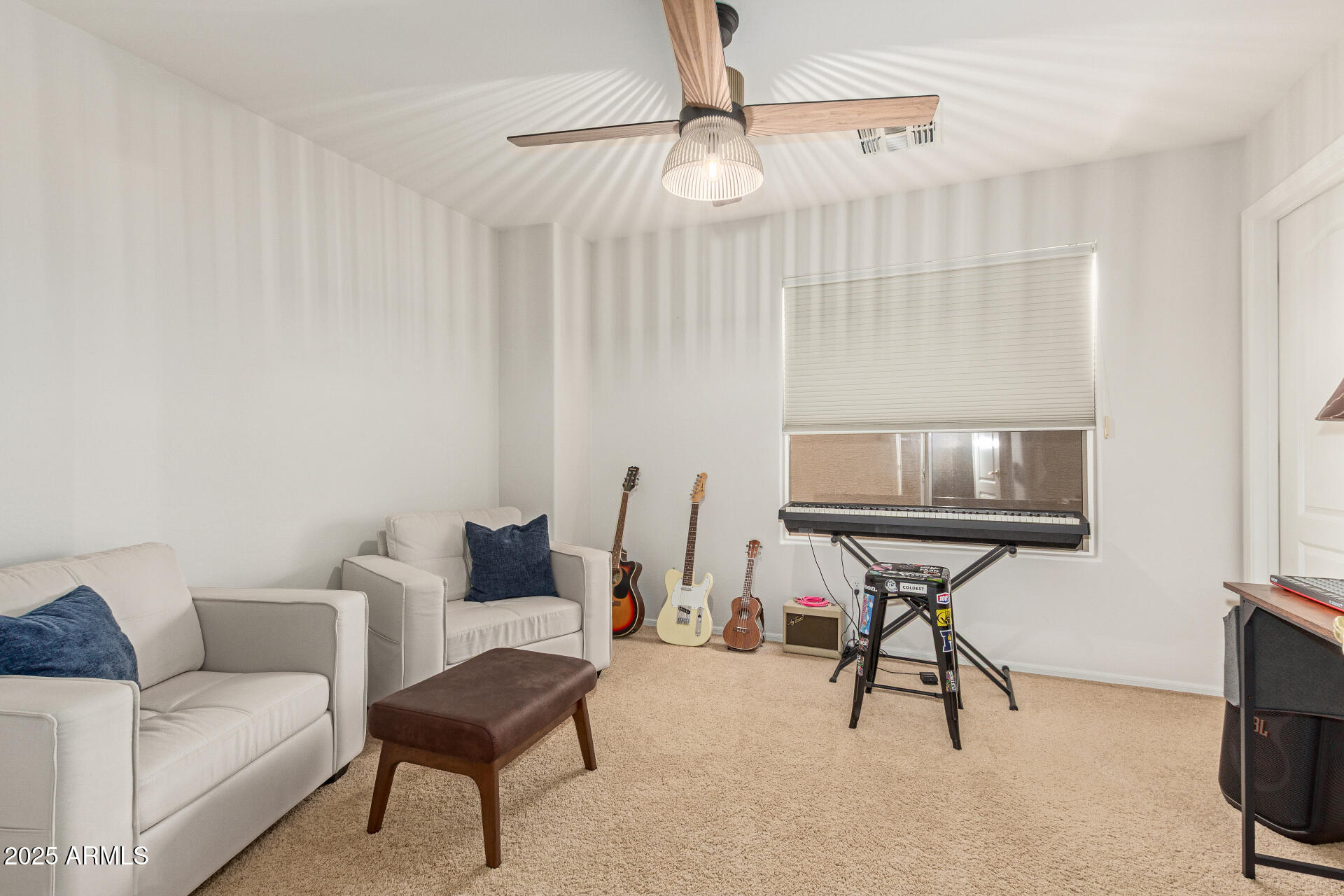 6003 West Oberlin Way Phoenix, AZ 85083 - Photo 32 of 69 a living room with furniture and a flat screen tv