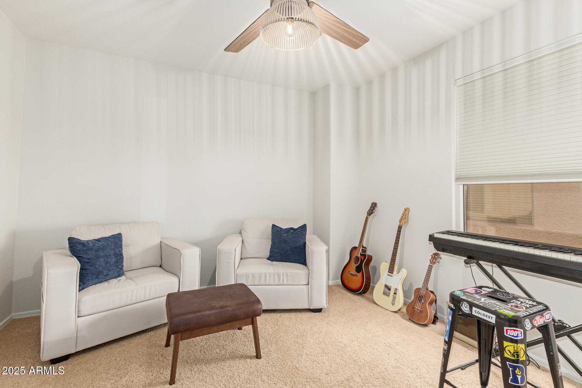 6003 West Oberlin Way Phoenix, AZ 85083 - Photo 33 of 69 a living room with furniture a rug and a window