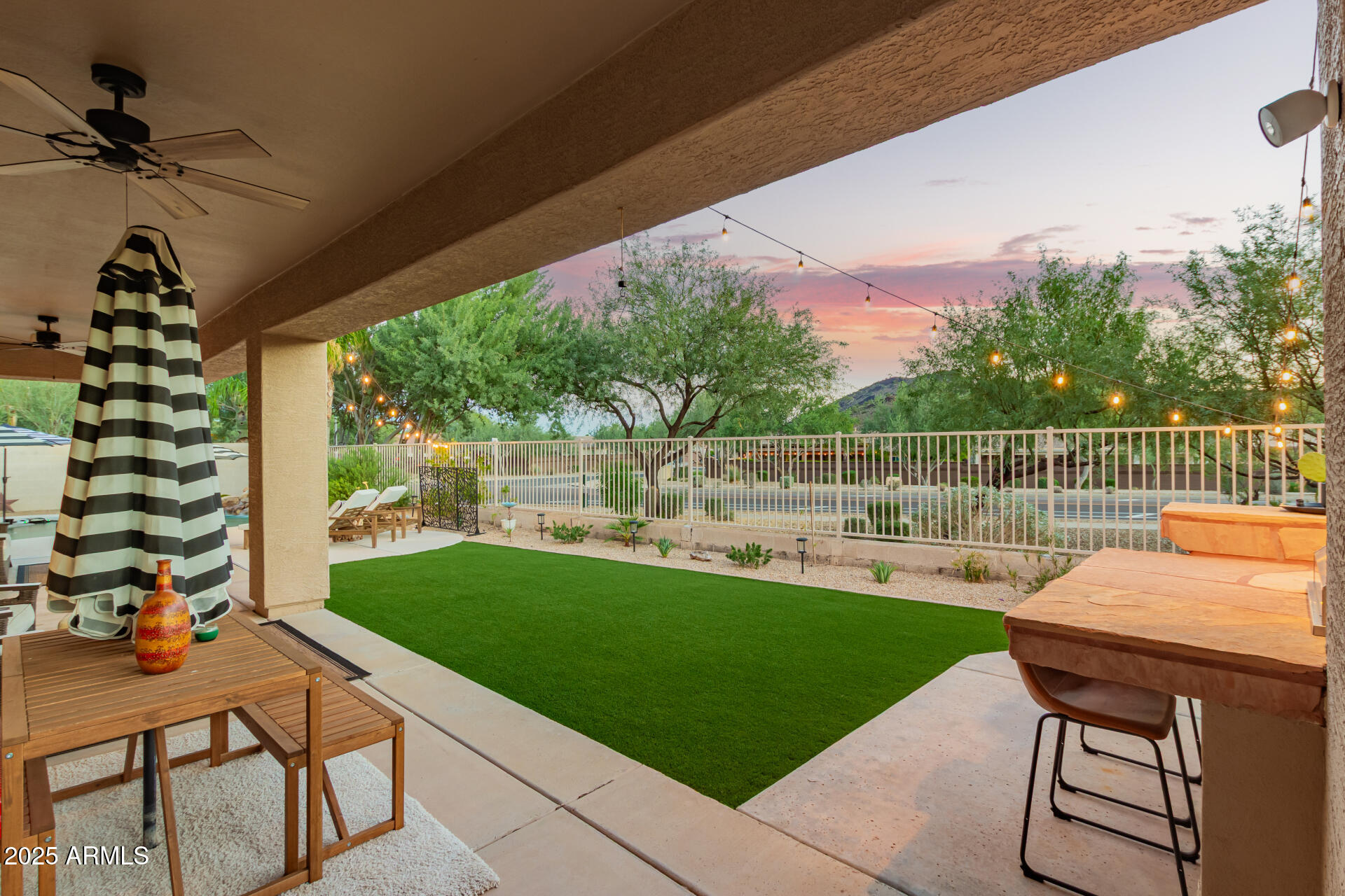 6003 West Oberlin Way Phoenix, AZ 85083 - Photo 42 of 69 a view of a chairs and table in patio with a yard