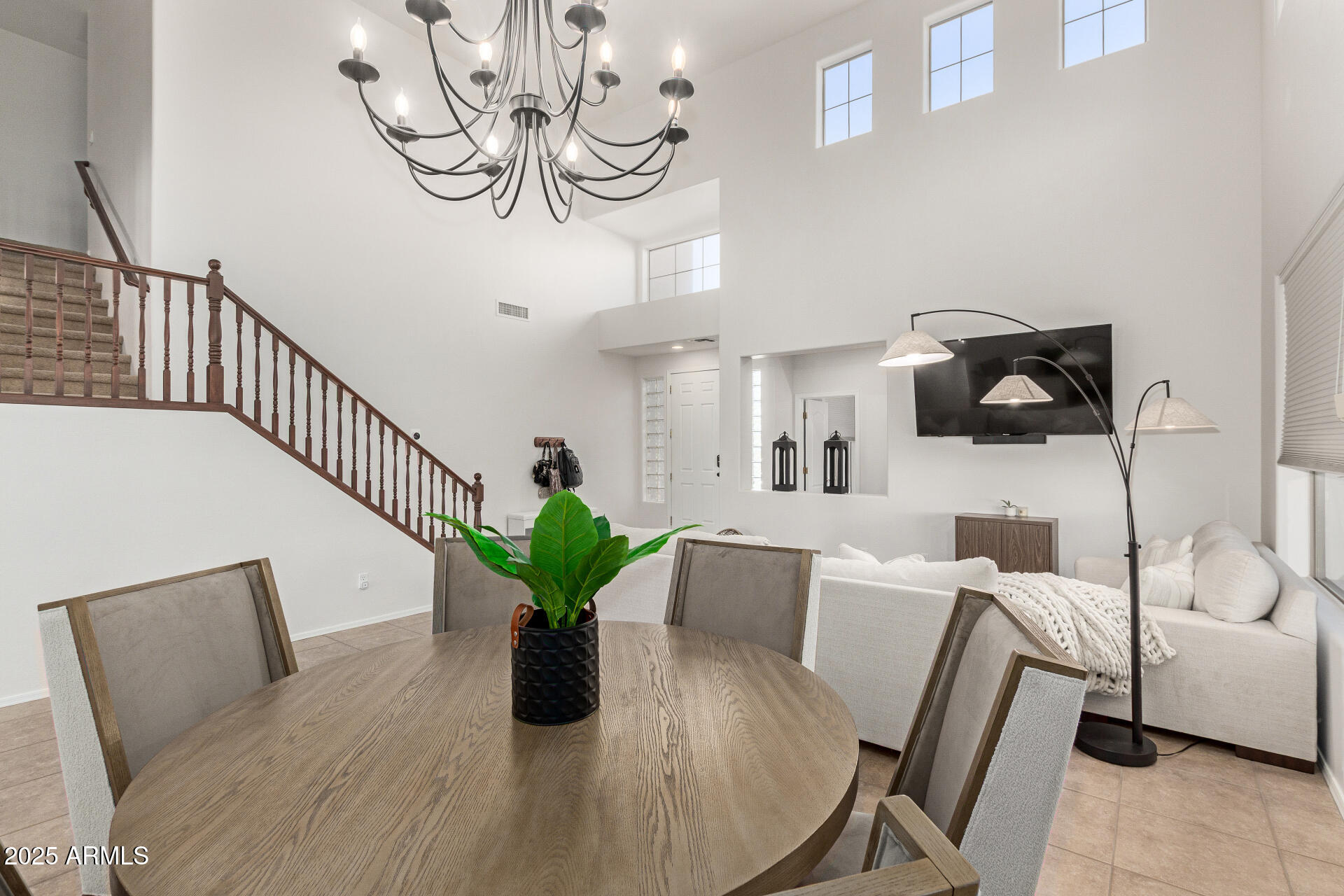 6003 West Oberlin Way Phoenix, AZ 85083 - Photo 10 of 69 a view of a livingroom with furniture and a potted plant