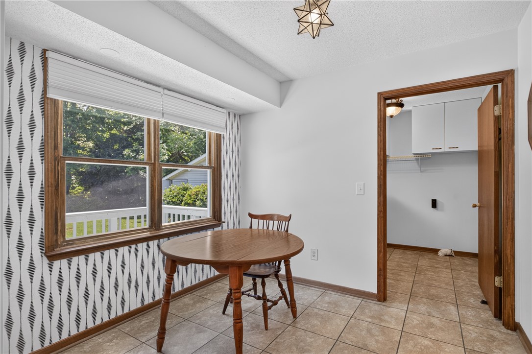 103 Dorsey Lane Walhalla, SC 29691 - Photo 10 of 42 A well-lit breakfast nook with patterned accent walls offers charming dining space.