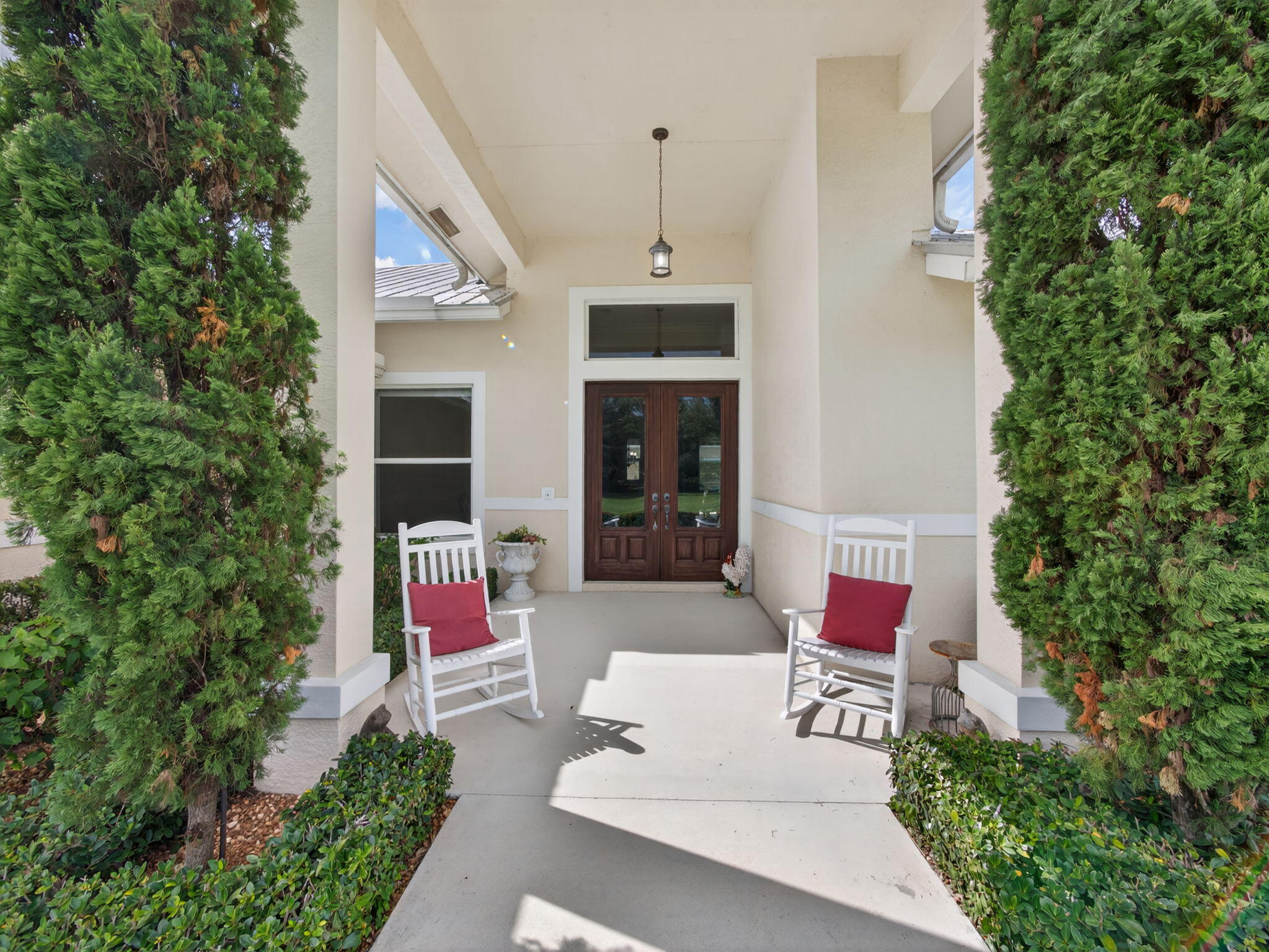 17593 Winterhawk Trail Jupiter, FL 33478 - Photo 14 of 49 a patio with table and chairs