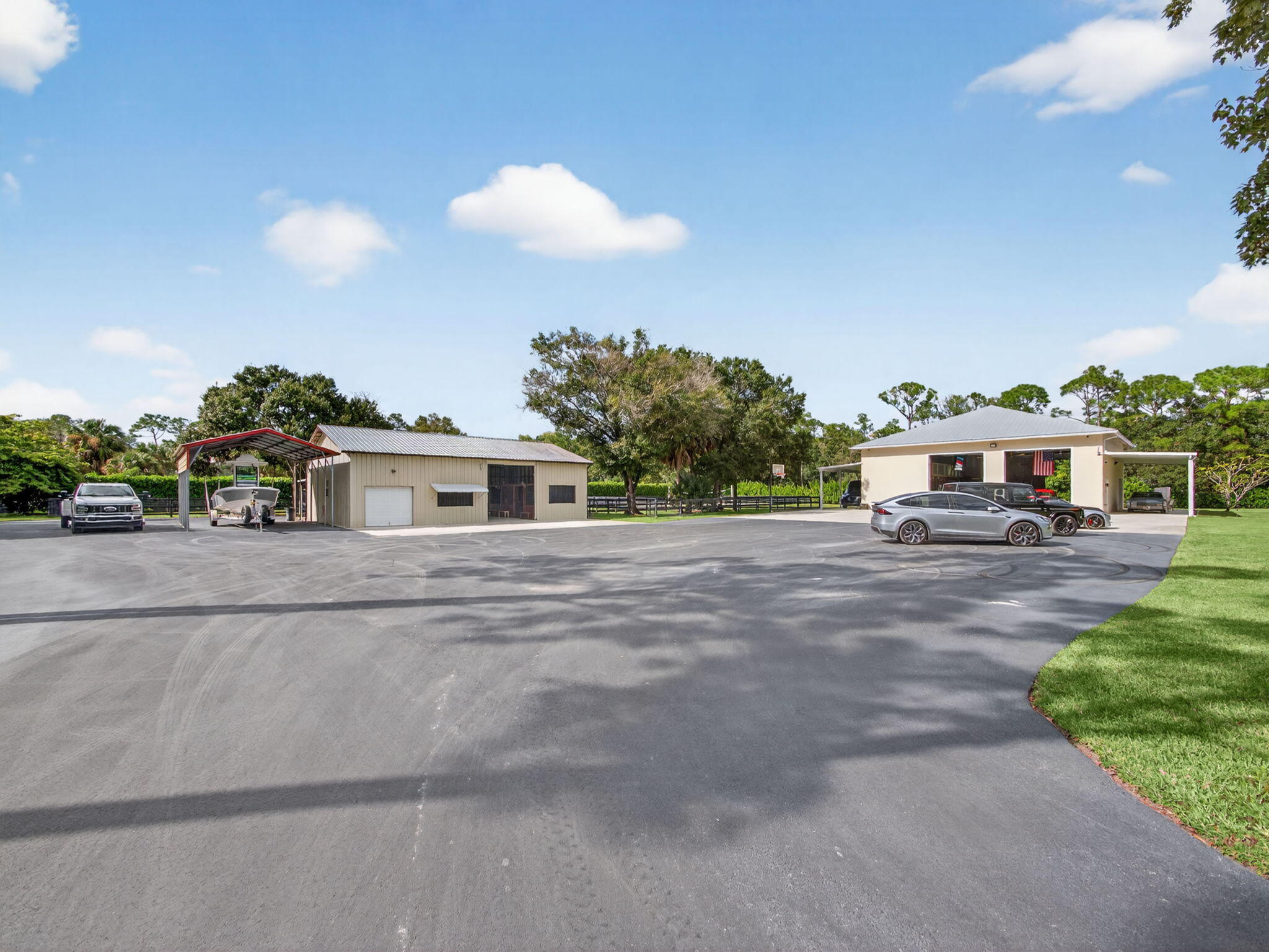 17593 Winterhawk Trail Jupiter, FL 33478 - Photo 27 of 49 a front view of a house with a garden