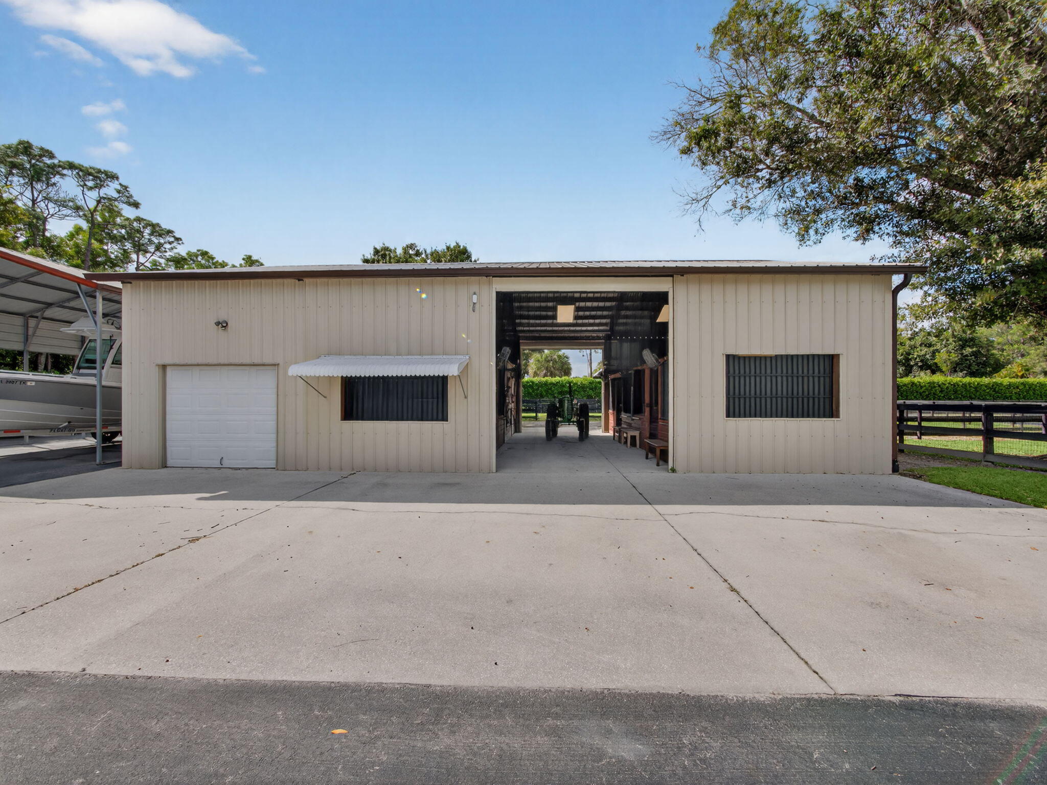 17593 Winterhawk Trail Jupiter, FL 33478 - Photo 28 of 49 front view of a house with a garage