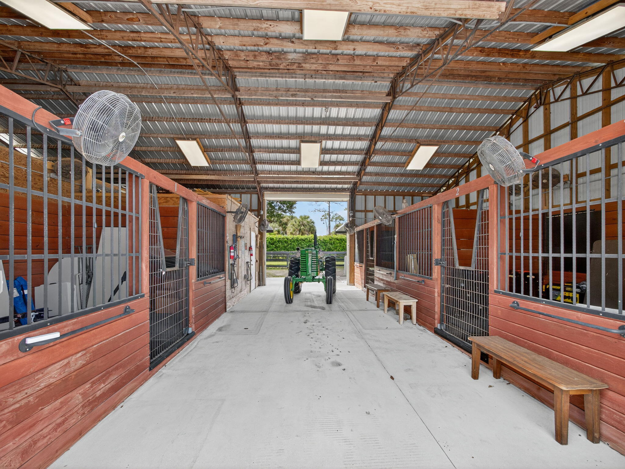17593 Winterhawk Trail Jupiter, FL 33478 - Photo 4 of 49 a view of a porch with a table and chairs