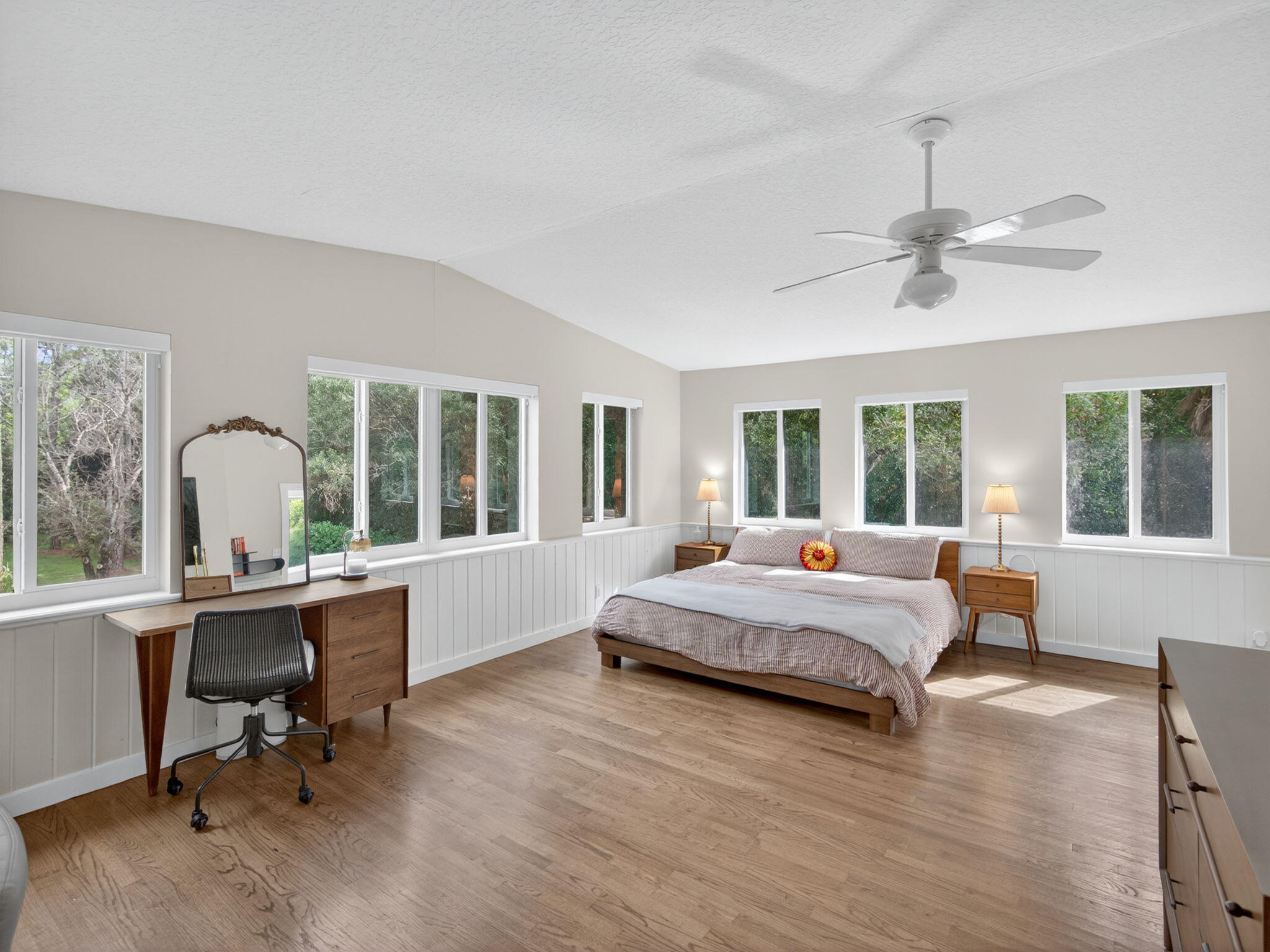 17593 Winterhawk Trail Jupiter, FL 33478 - Photo 45 of 49 a spacious bedroom with a bed and a table