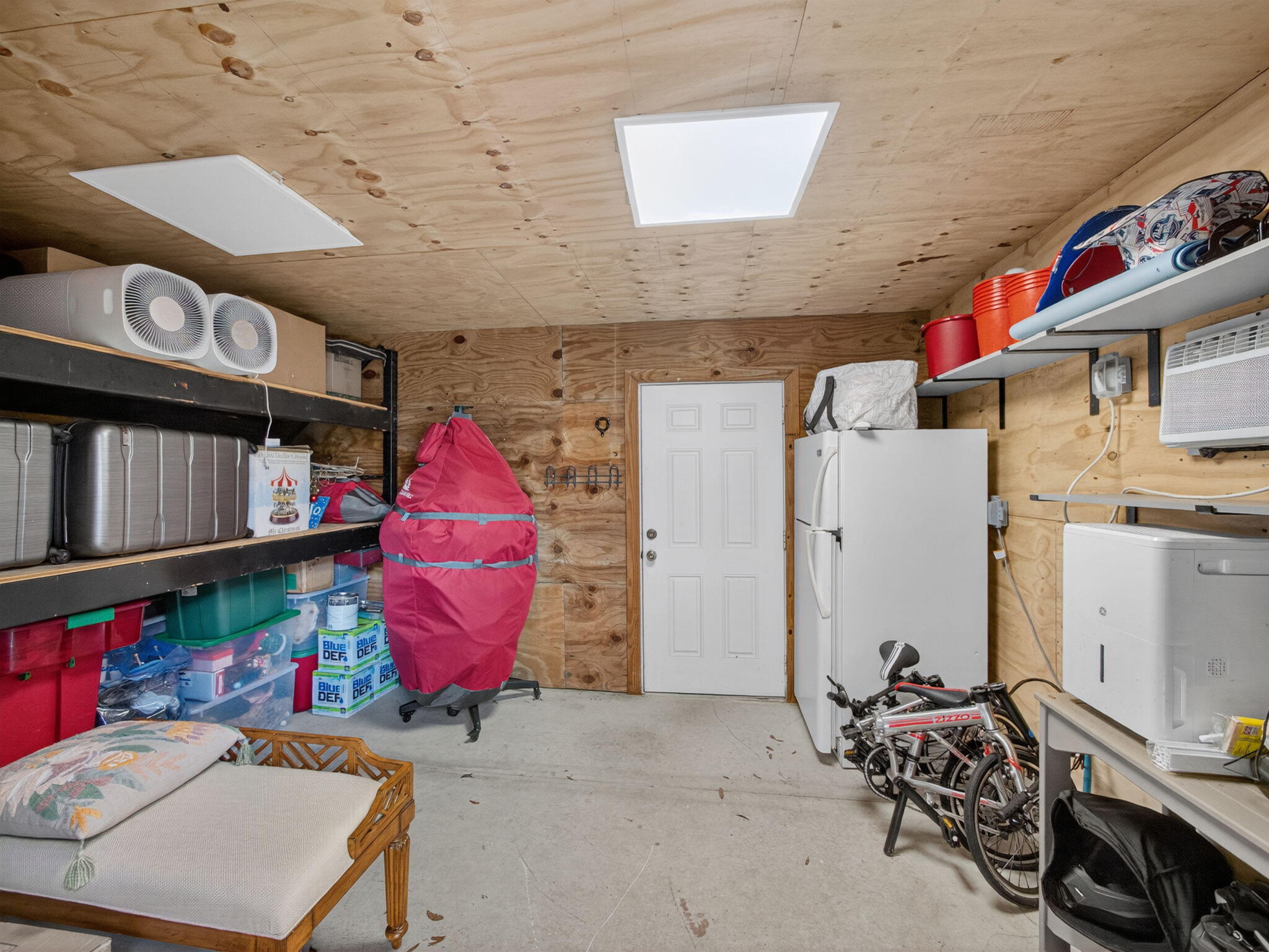 17593 Winterhawk Trail Jupiter, FL 33478 - Photo 46 of 49 a room with lots of furniture and air hockey table