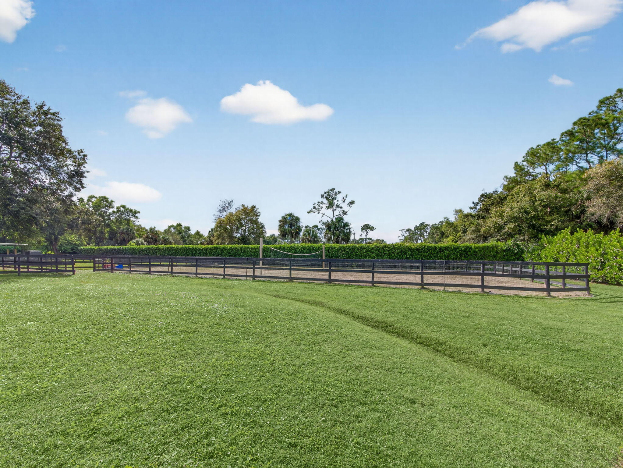 17593 Winterhawk Trail Jupiter, FL 33478 - Photo 6 of 49 a view of a green field