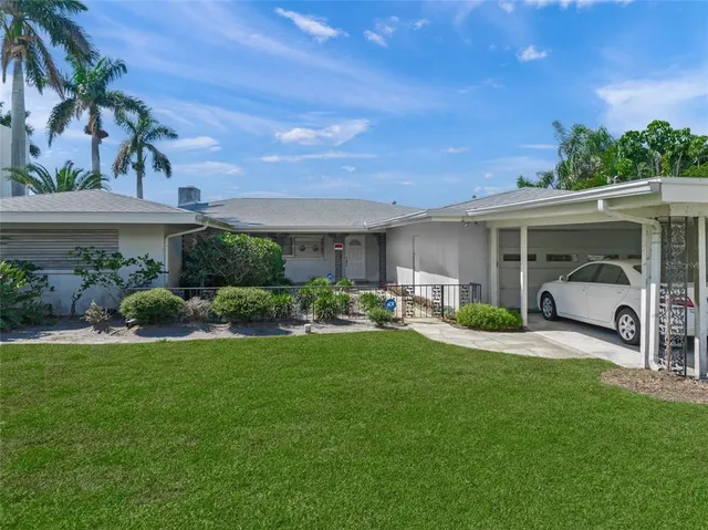 a view of a lake and a yard