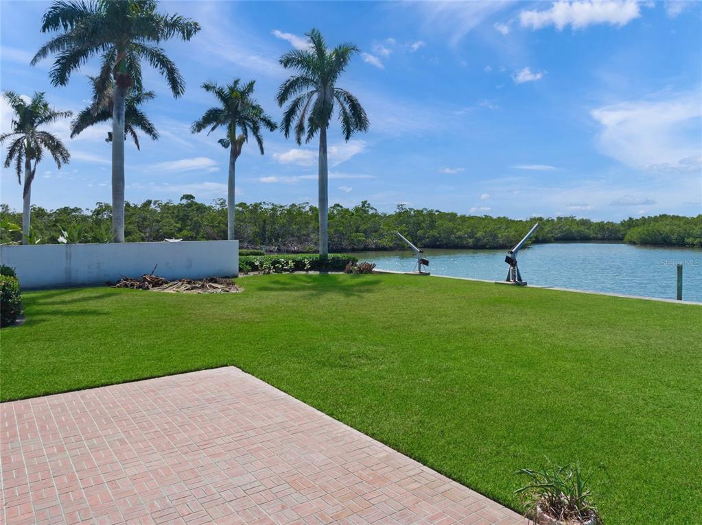 1386 Tangier Way Sarasota, FL 34239 - Photo 13 of 26 a view of an outdoor space and a yard