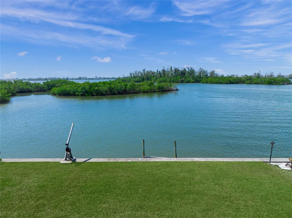 1386 Tangier Way Sarasota, FL 34239 - Photo 16 of 26 a view of a lake