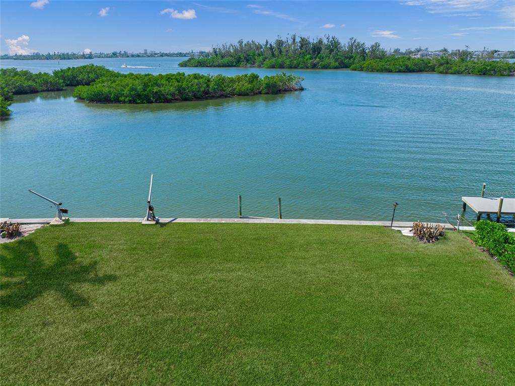 1386 Tangier Way Sarasota, FL 34239 - Photo 17 of 26 an aerial view of a houses with outdoor space and lake view