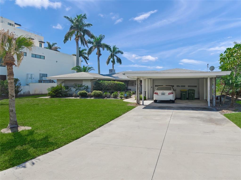 1386 Tangier Way Sarasota, FL 34239 - Photo 10 of 26 a view of house and outdoor space