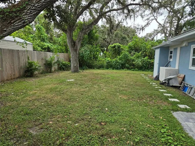 a view of a backyard with a garden