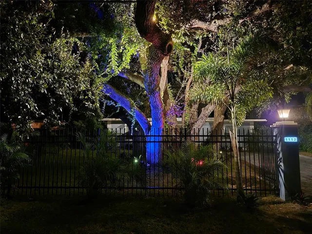 a view of street along with trees
