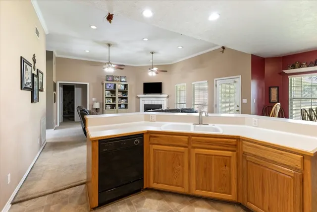 a spacious bathroom with a sink and a mirror