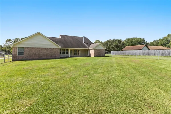a house with garden in front of it