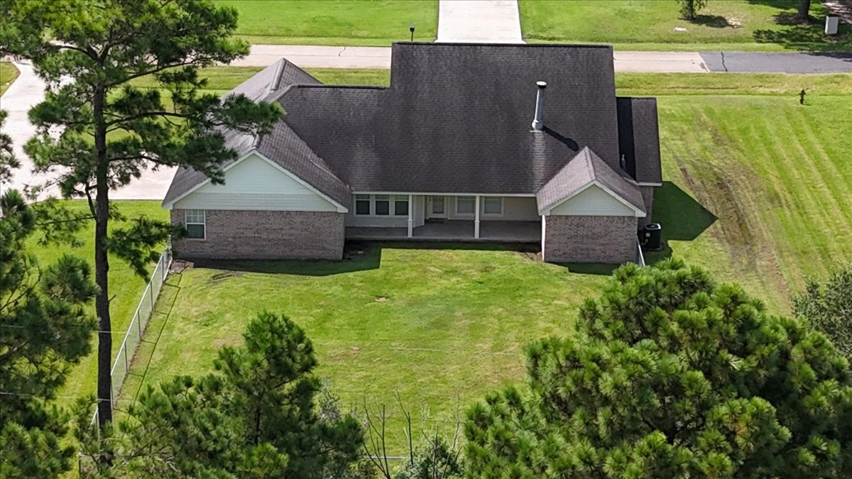 544 Meadow Lane Winnie, TX 77665 - Photo 6 of 38 an aerial view of a house