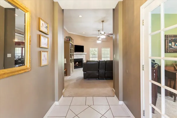 a view of a living room with windows