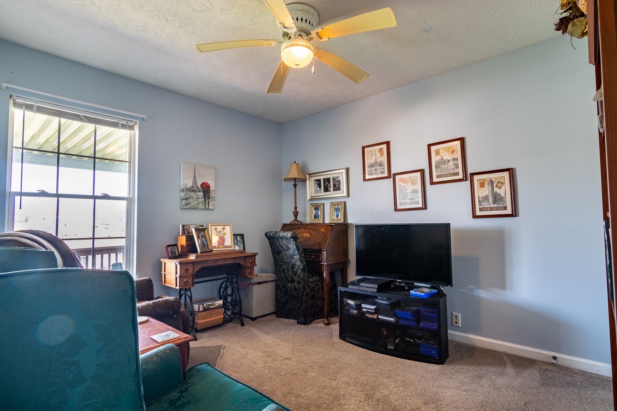 105 Elder Drive Springfield, TN 37172 - Photo 11 of 15 a living room with furniture and a flat screen tv