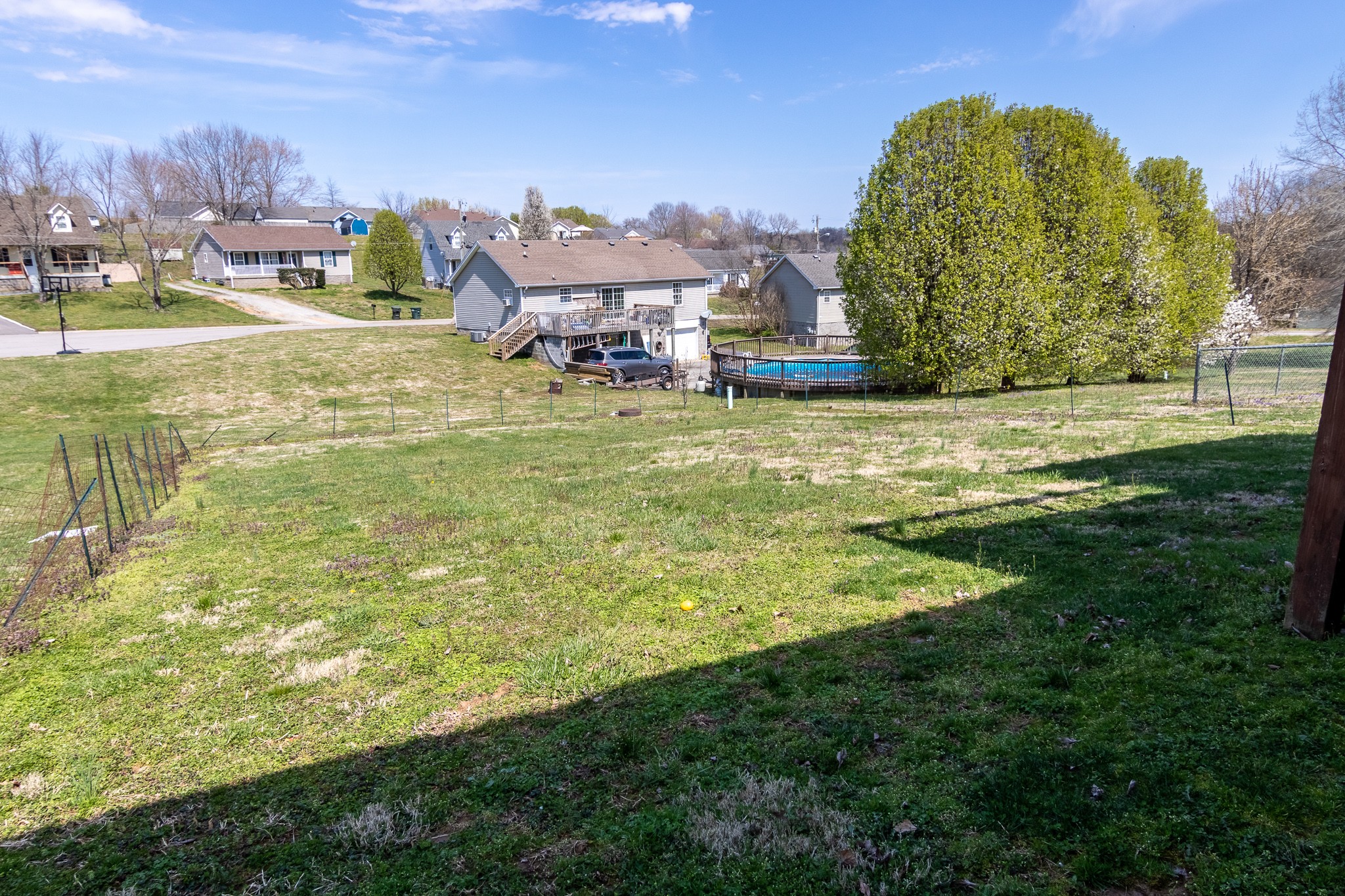 105 Elder Drive Springfield, TN 37172 - Photo 15 of 15 a swimming pool with outdoor seating and yard