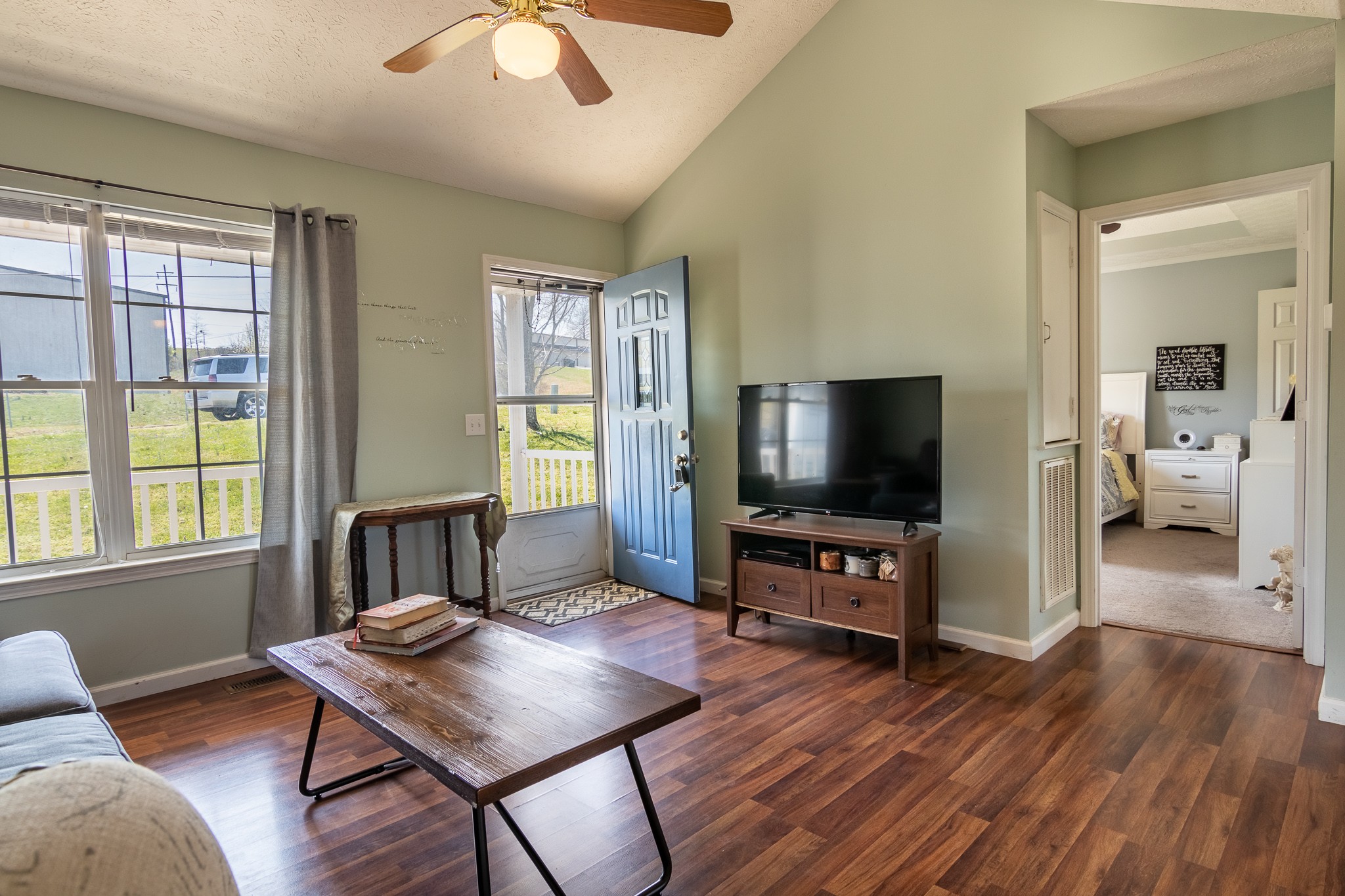 105 Elder Drive Springfield, TN 37172 - Photo 4 of 15 a living room with furniture and a flat screen tv