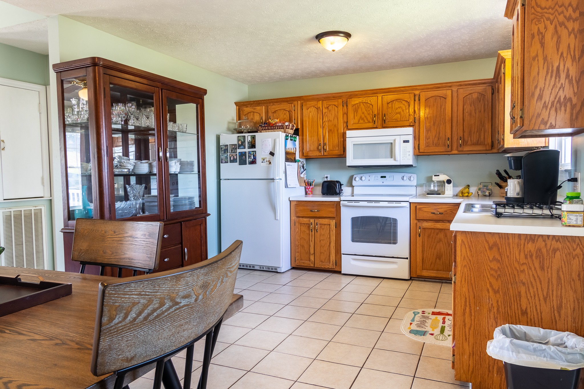 105 Elder Drive Springfield, TN 37172 - Photo 6 of 15 a kitchen with stainless steel appliances granite countertop a stove a sink dishwasher and a refrigerator