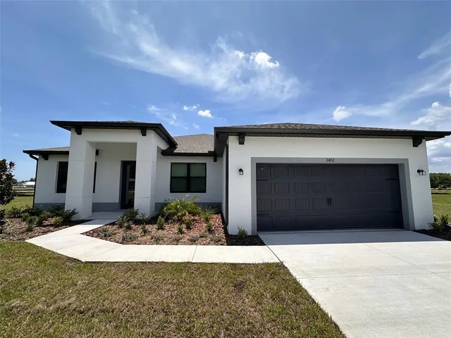 a view of a house with a garage