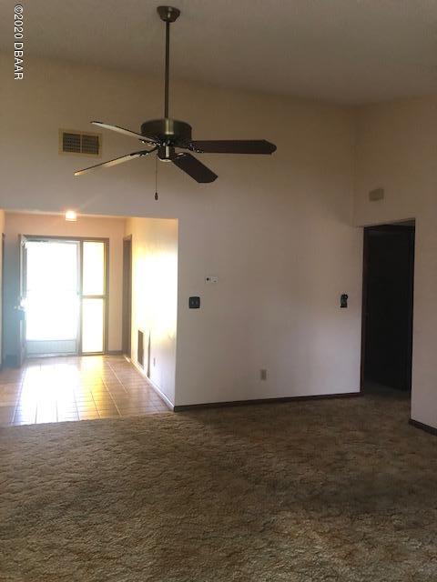 1241 Mardrake Road Daytona Beach, FL 32114 - Photo 3 of 32 FOYER GOING INTO LIVING AREA