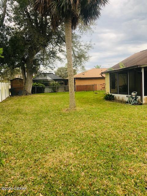 1241 Mardrake Road Daytona Beach, FL 32114 - Photo 31 of 32 FENCED YARD