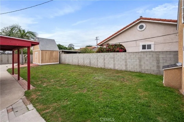 a view of a backyard with a garden