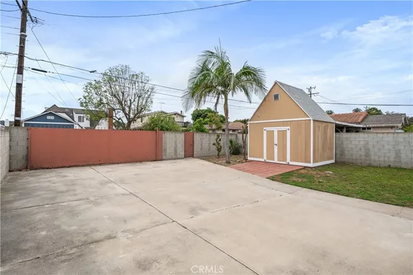 a view of garage and yard