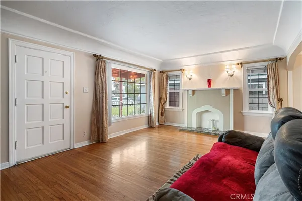 a view of livingroom with furniture wooden floor and window