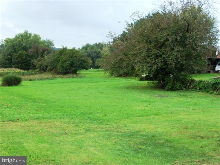 946 Long Mill Road Telford, PA 18969 - Photo 4 of 14 a view of field with trees in the background