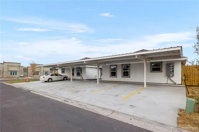 a view of a house with a patio