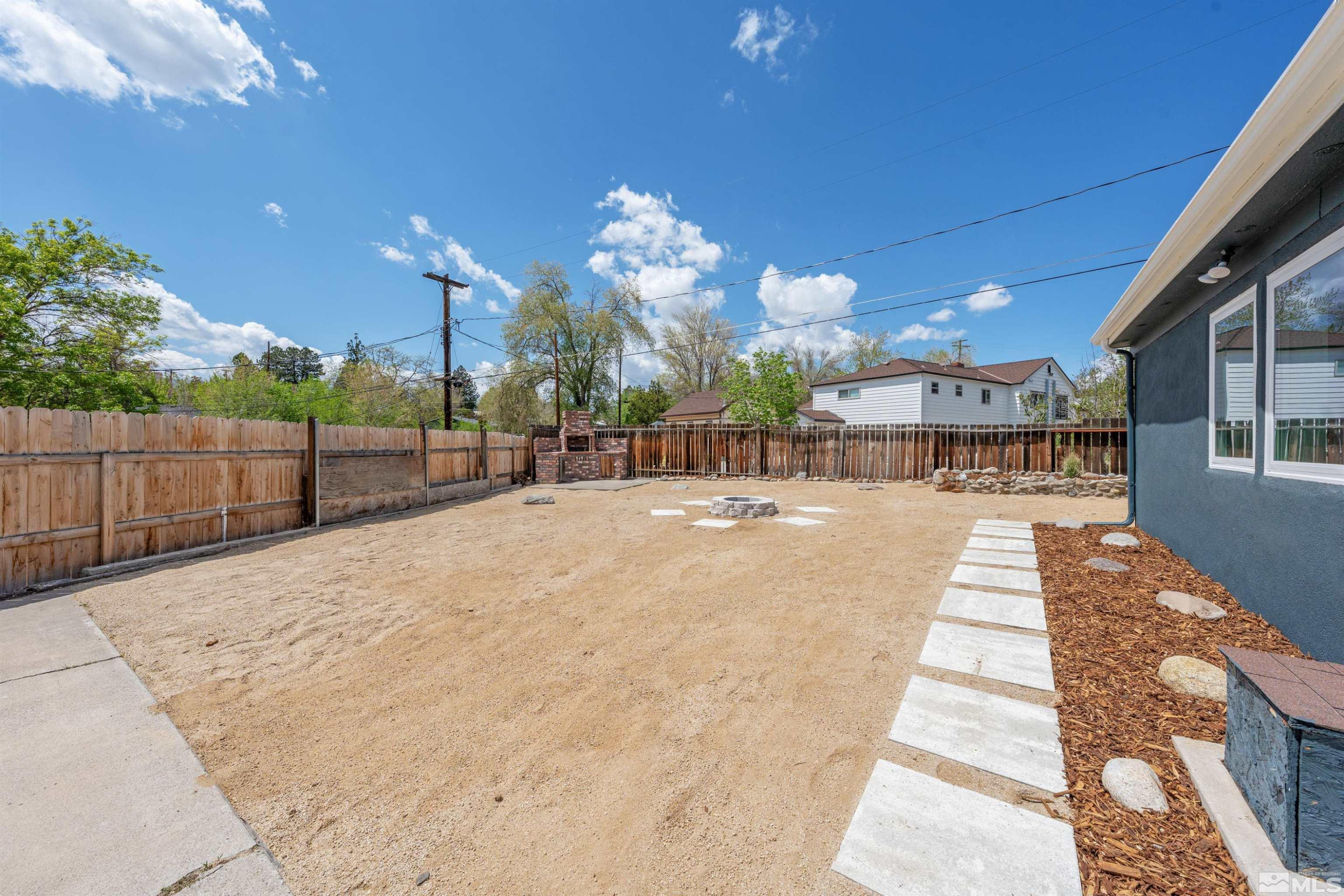 983 Melba Drive Reno, NV 89503 - Photo 29 of 39 a view of a swimming pool with a patio