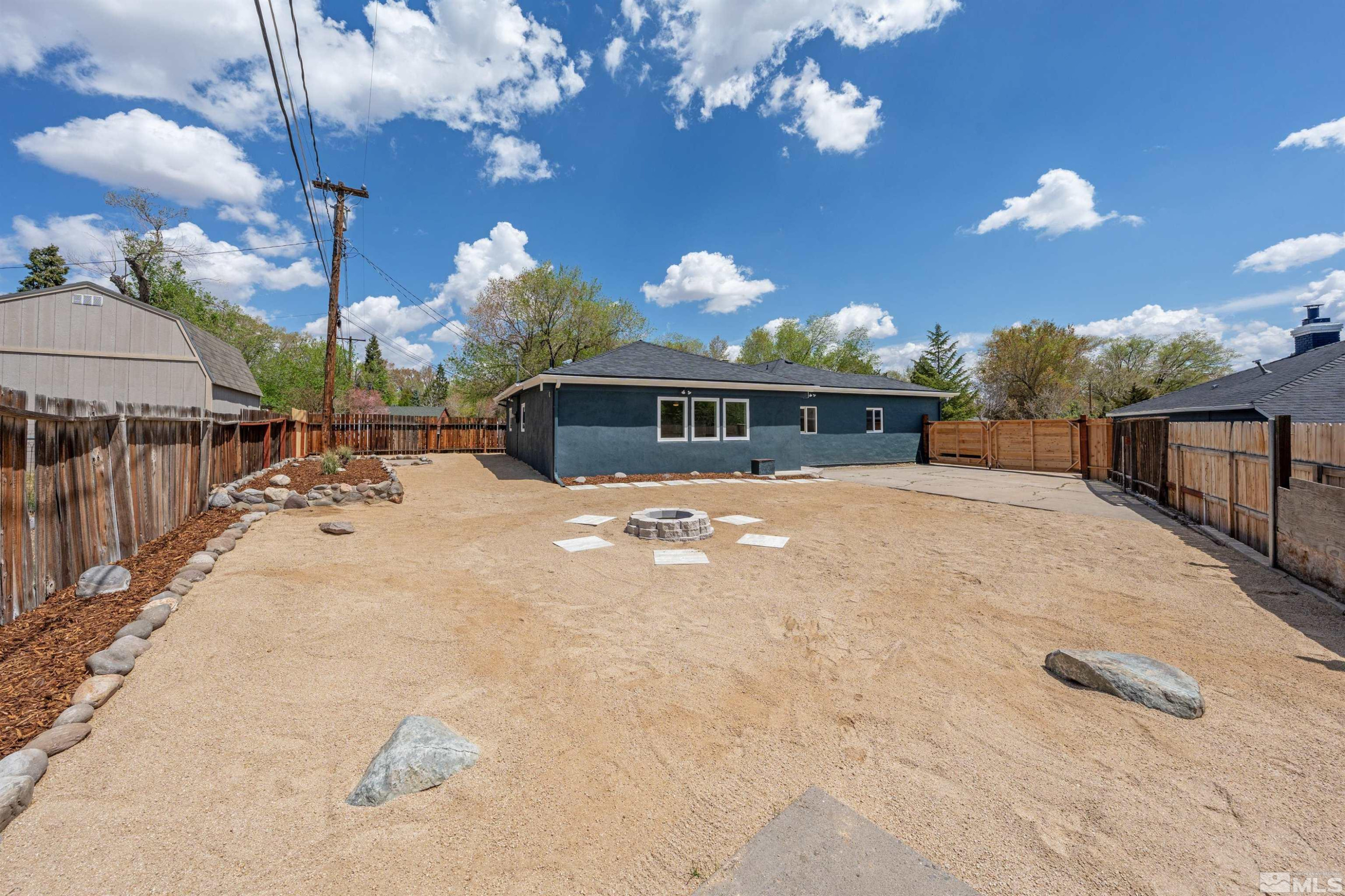 983 Melba Drive Reno, NV 89503 - Photo 32 of 39 a view of a house with a yard