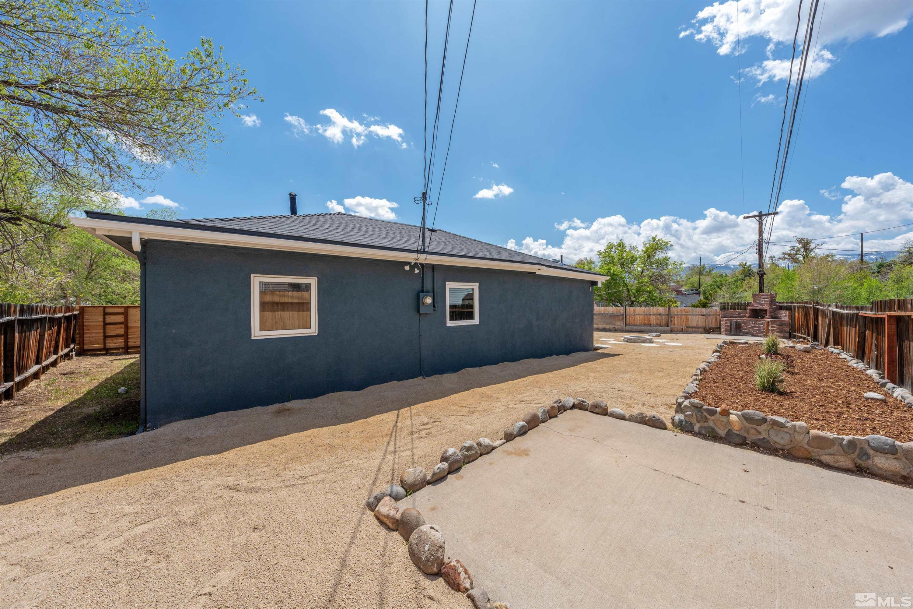 983 Melba Drive Reno, NV 89503 - Photo 33 of 39 a patio with table and chairs