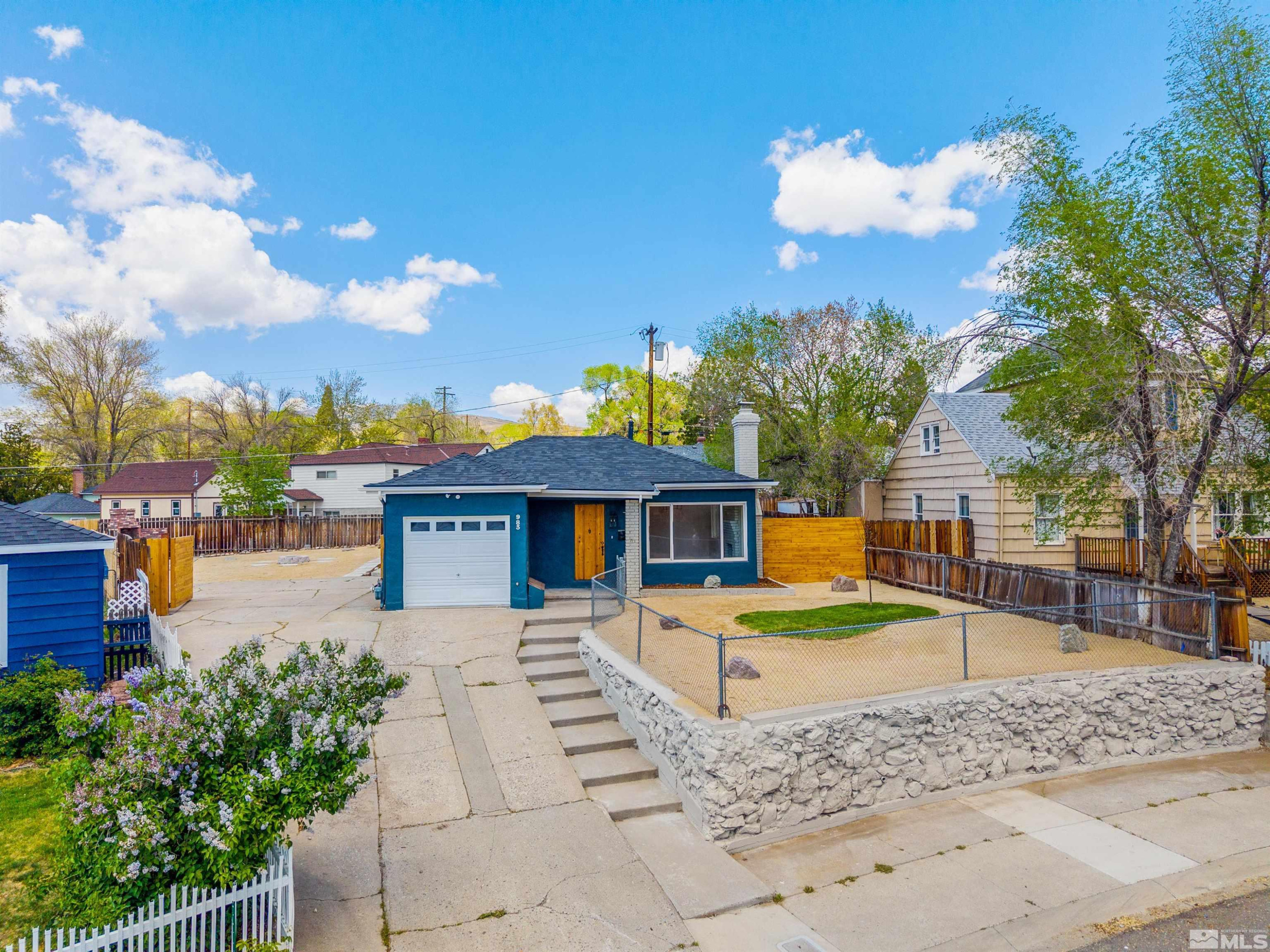 983 Melba Drive Reno, NV 89503 - Photo 35 of 39 a front view of a house with a yard