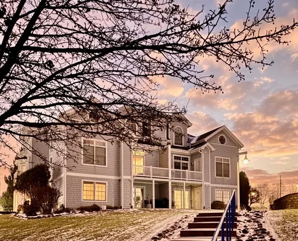 front view of a house with a trees