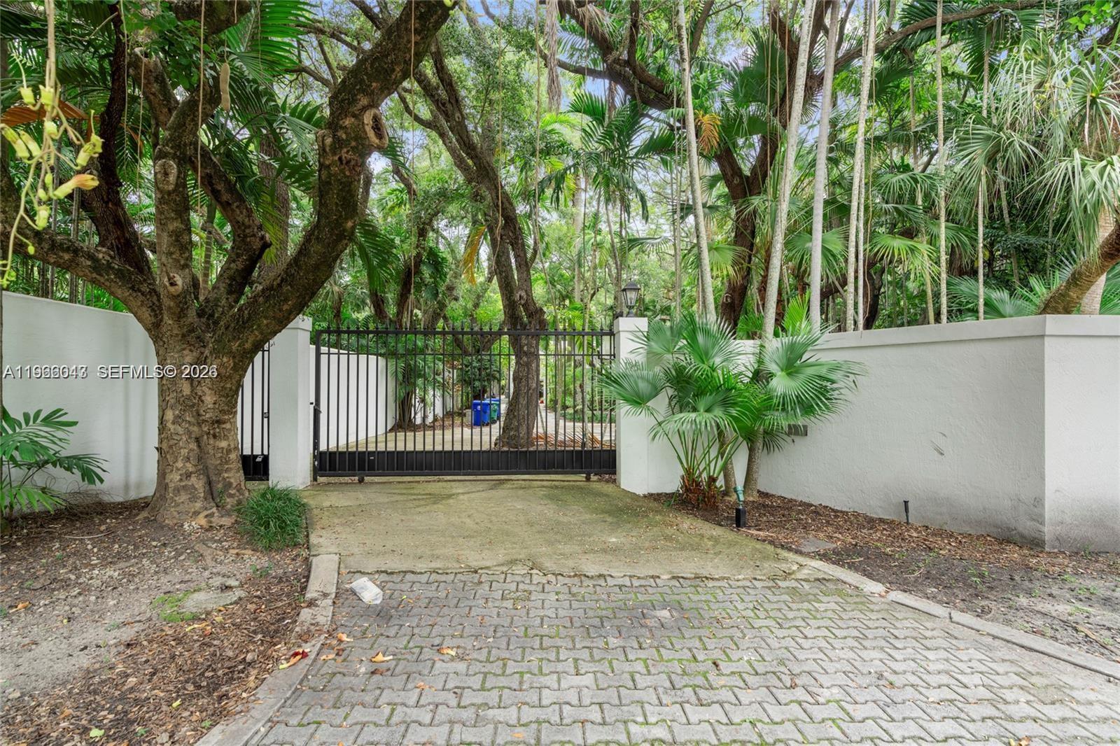 1951 Secoffee Street Miami, FL 33133 - Photo 24 of 24 a view of a yard with plants and trees