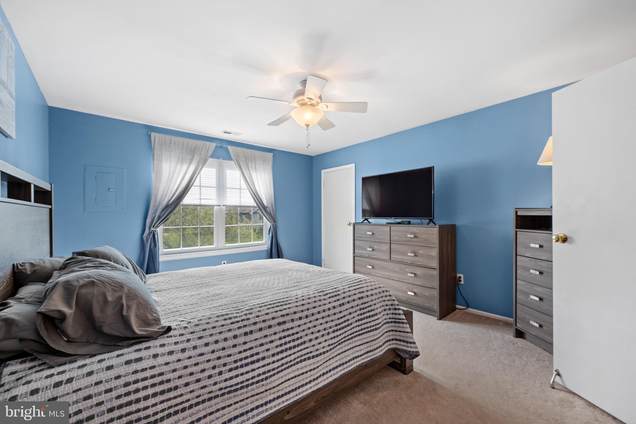 32 Brighton Place Sewell, NJ 08080 - Photo 13 of 21 a bedroom with a bed and a flat screen tv