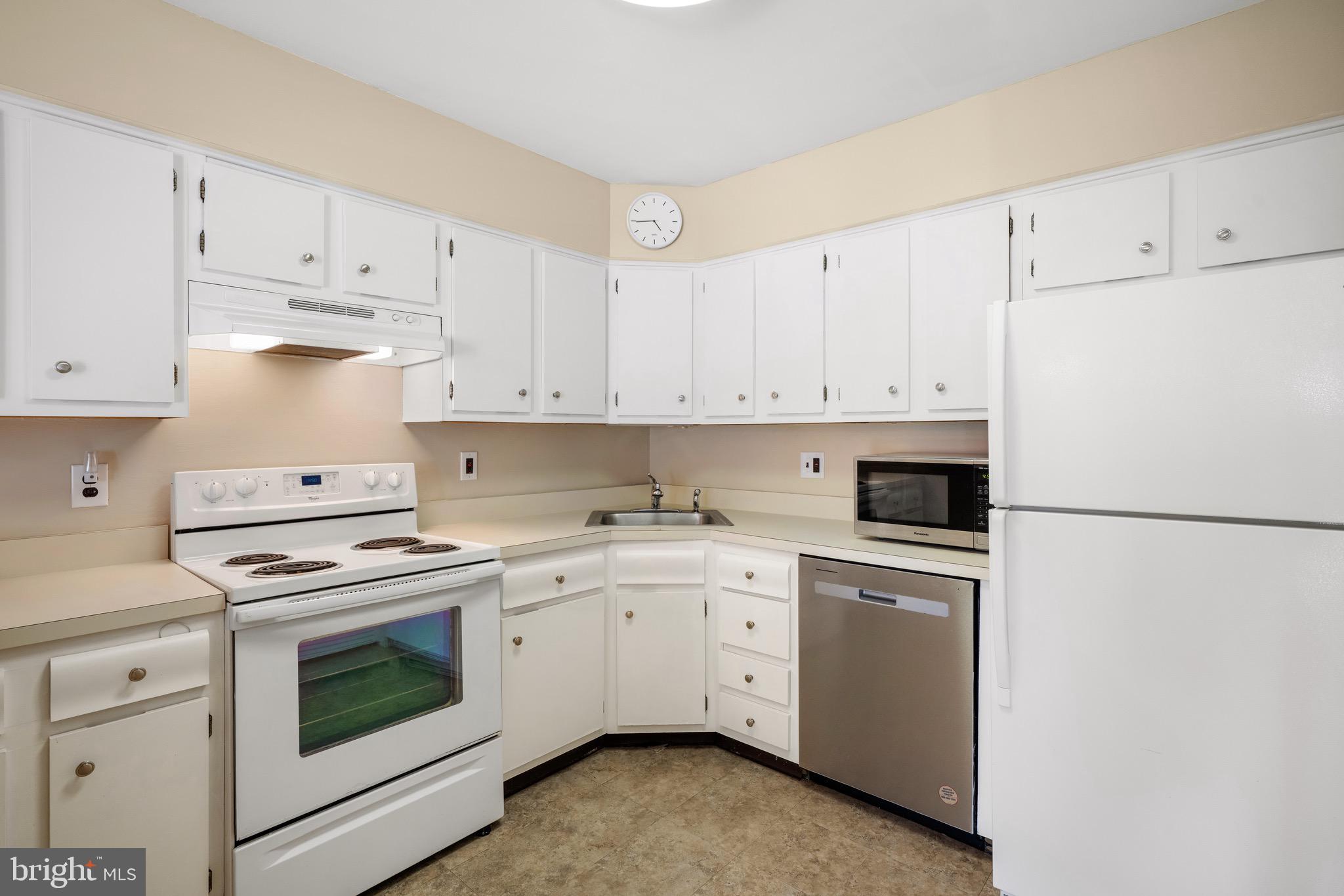 32 Brighton Place Sewell, NJ 08080 - Photo 6 of 21 a kitchen with cabinets appliances a sink and a counter space